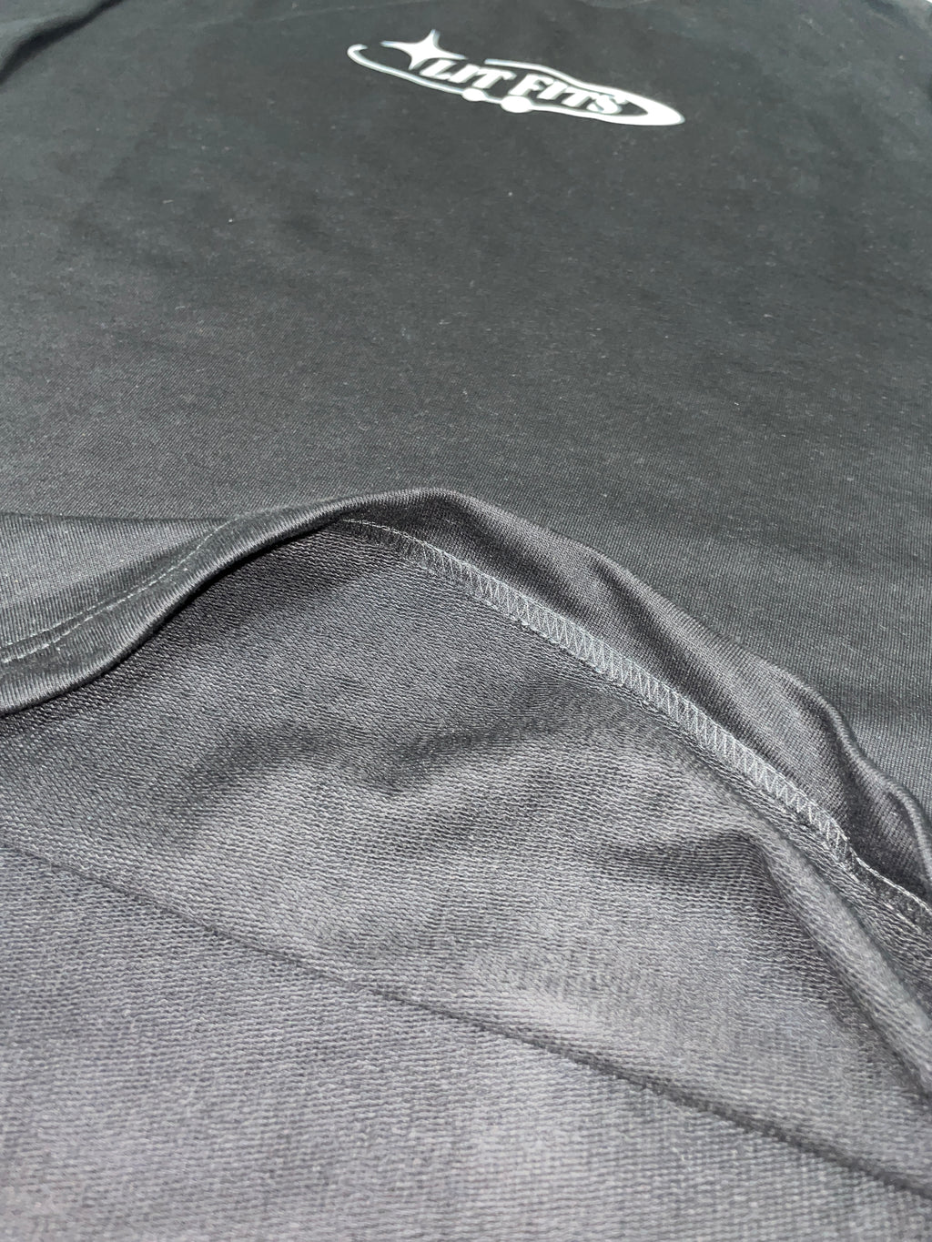 Black oversized fit T-shirt showcasing premium 240 gsm french terry fabric and HD print detail.
